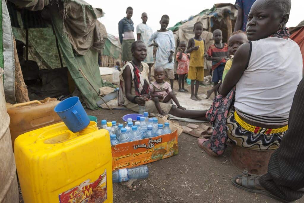 People collecting water at a refugee camp in Juba, South Sudan.