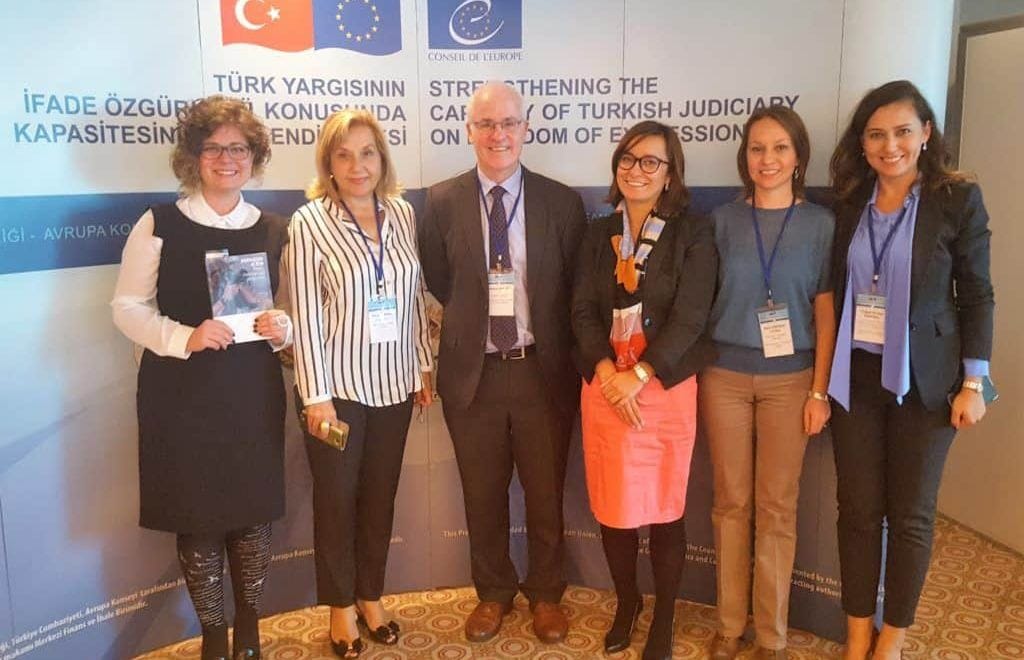 Aidan White with the event organisers, including Turkey Press Council chair Pinar Turenc, (second left)