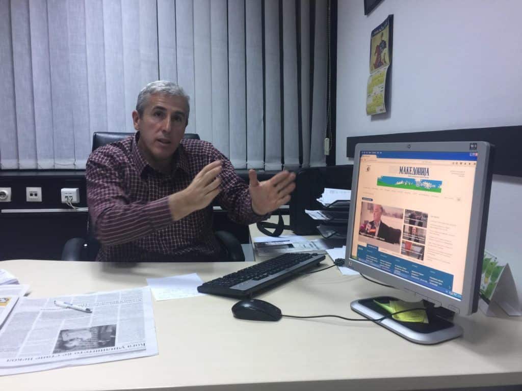 GOING ONLINE: Chief editor Aleksandar Dimkovski demonstrates the digital version of his «HOBA Makedonia».